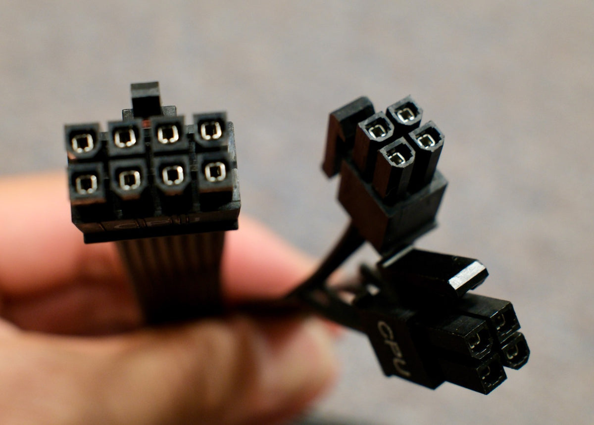 Close-up of the 8-pin and 4+4-pin connectors of the EVGA CPU EPS cable