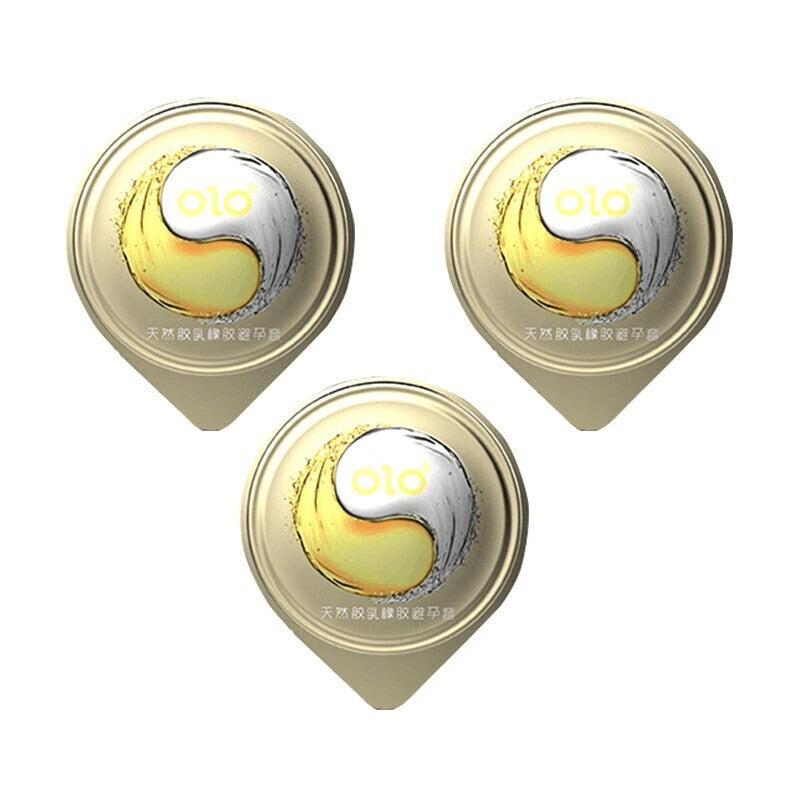 Three round OLO condom wrappers with a yin-yang design
