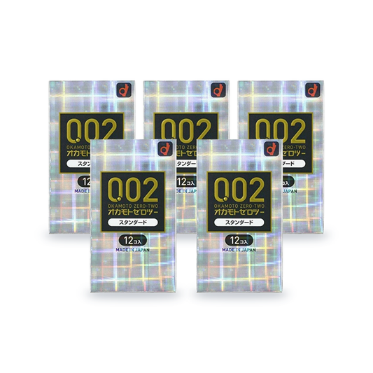 Five Okamoto Zero-Two 002 Standard retail boxes, 12 condoms per box, Japanese packaging, front view